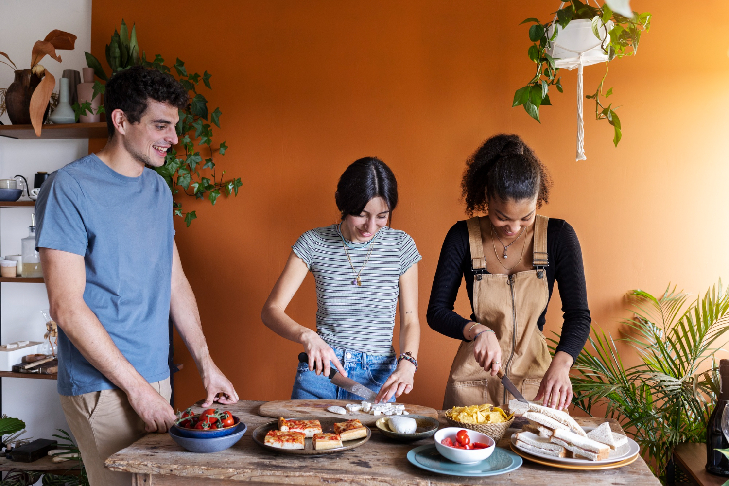 A group of students making food together