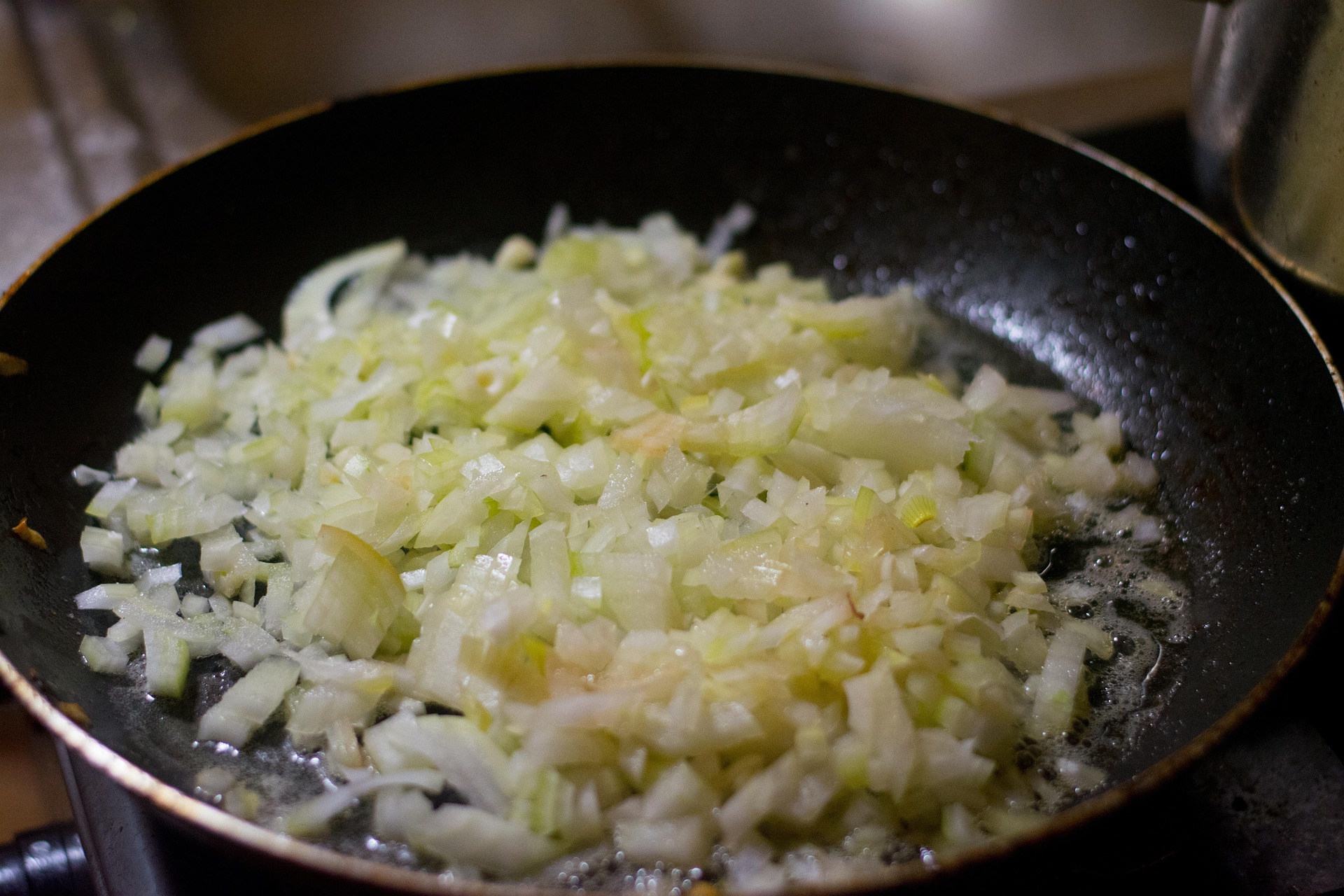 Onions frying in a pan